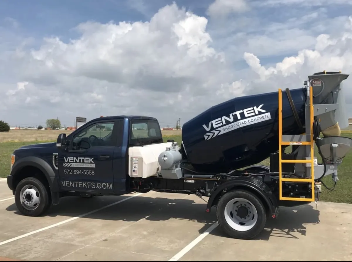 Ventek navy F-550 short load concrete mixer truck for small residential pours in Dallas-Fort Worth