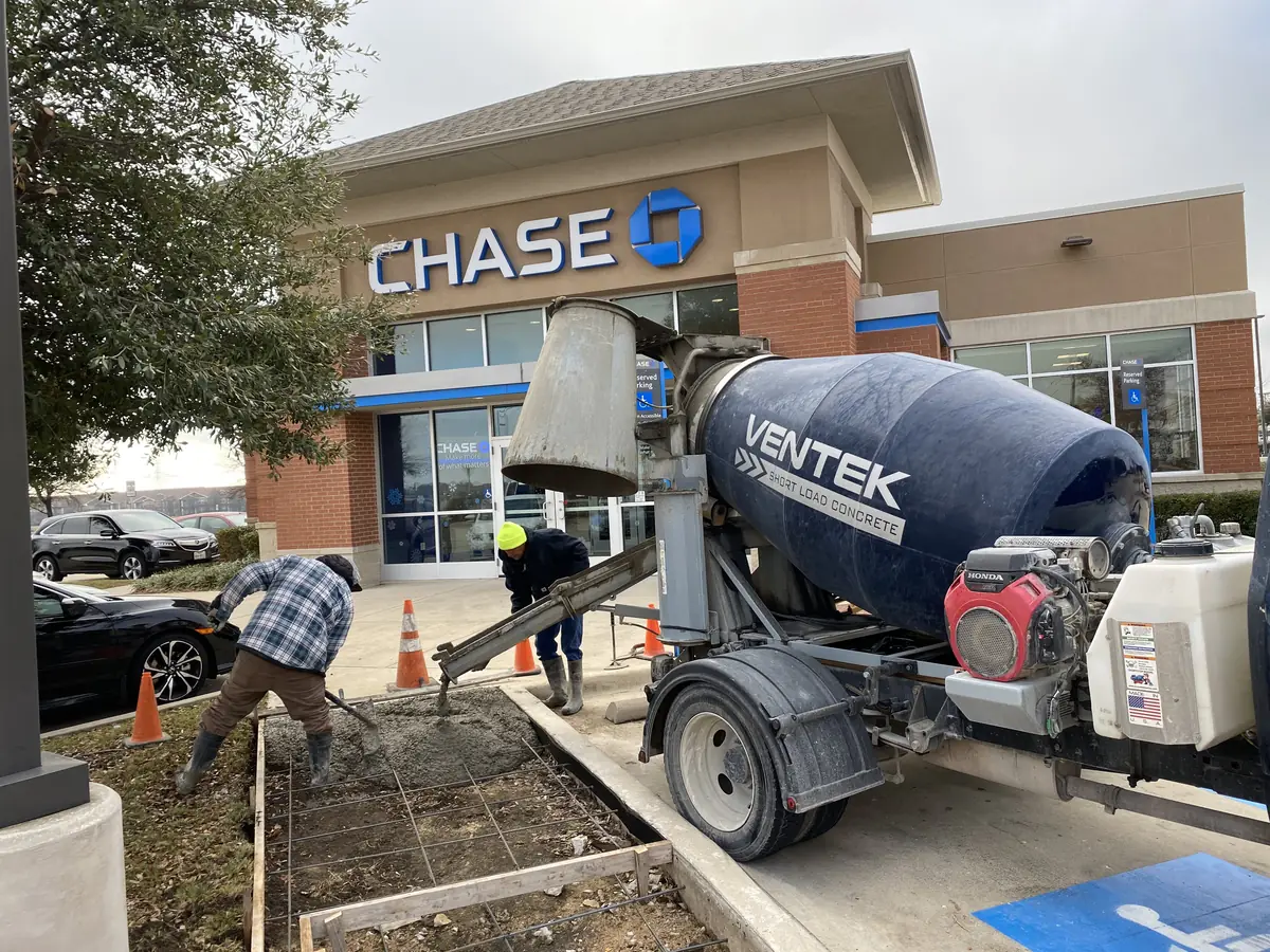 Ventek concrete mixer truck at a commercial job site in the DFW metroplex
